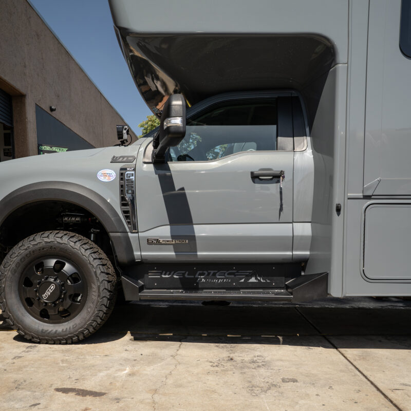 WeldTec Designs side steps for Ford F-550 and F-600 Super C RVs with wide step surface and integrated body-line fitment