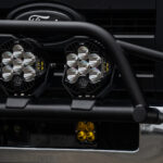 WeldTec Designs Ford E-Series Light Bar Prerunner mounted on a factory chrome bumper with three LED auxiliary lights.